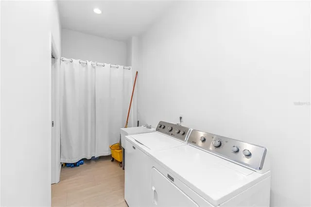 a view of a bathroom with tub