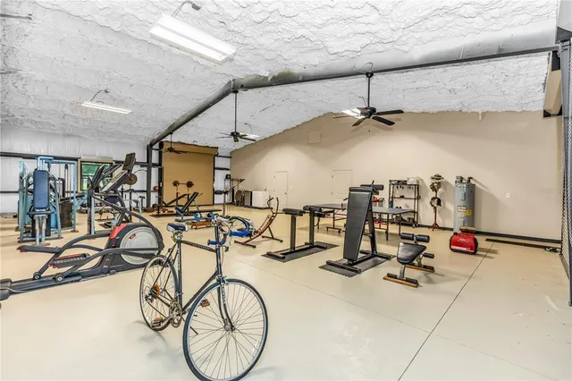 a bathroom with a sink a mirror and a shower