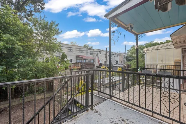 a view of a balcony with city view
