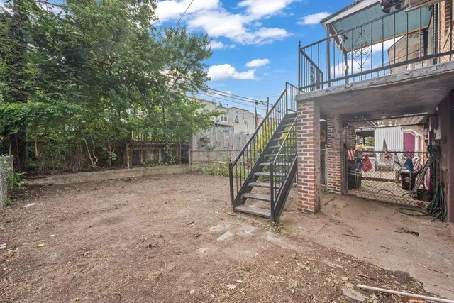 a view of an house with a park