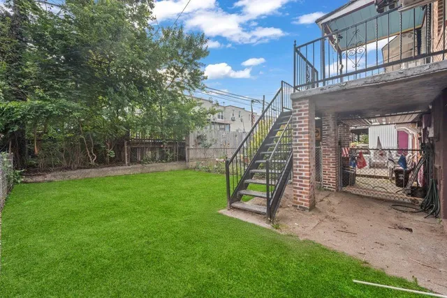 a view of a house with a park