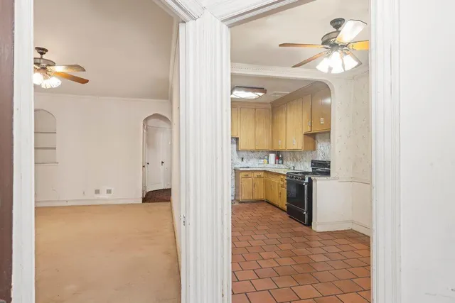 a view of a kitchen with a sink
