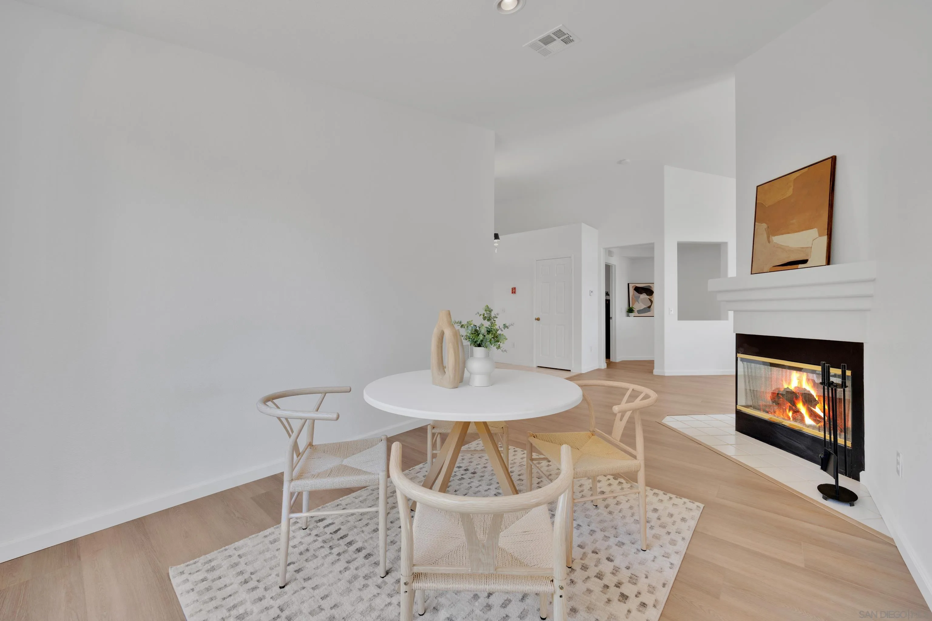 2334 Columbine Road Alpine, CA 91901 - Photo 15 of 42 a view of a dining room with furniture and a fireplace