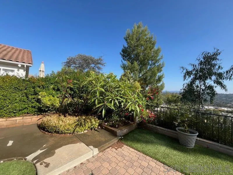 2334 Columbine Road Alpine, CA 91901 - Photo 26 of 42 a view of a backyard with plants and outdoor seating