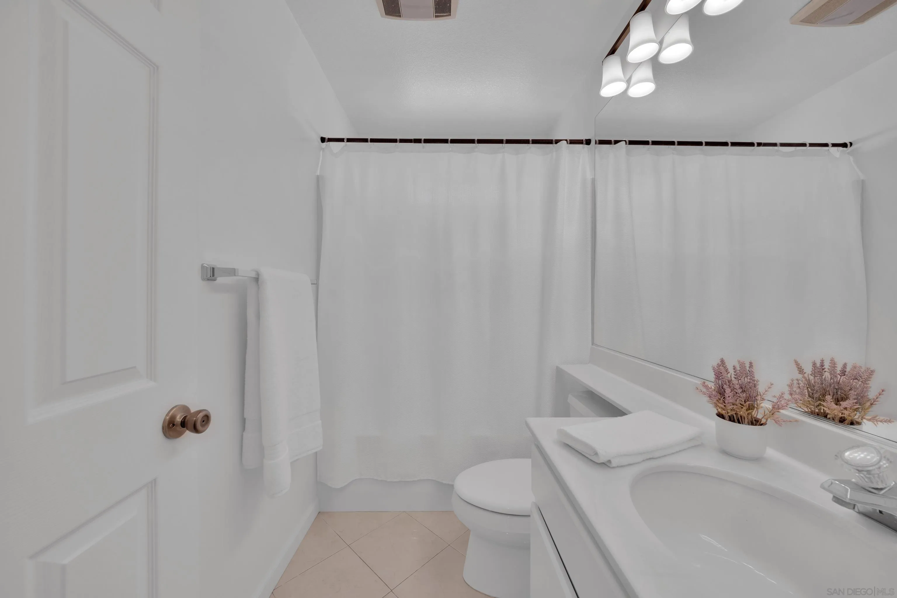 2334 Columbine Road Alpine, CA 91901 - Photo 29 of 42 a bathroom with a sink toilet and shower