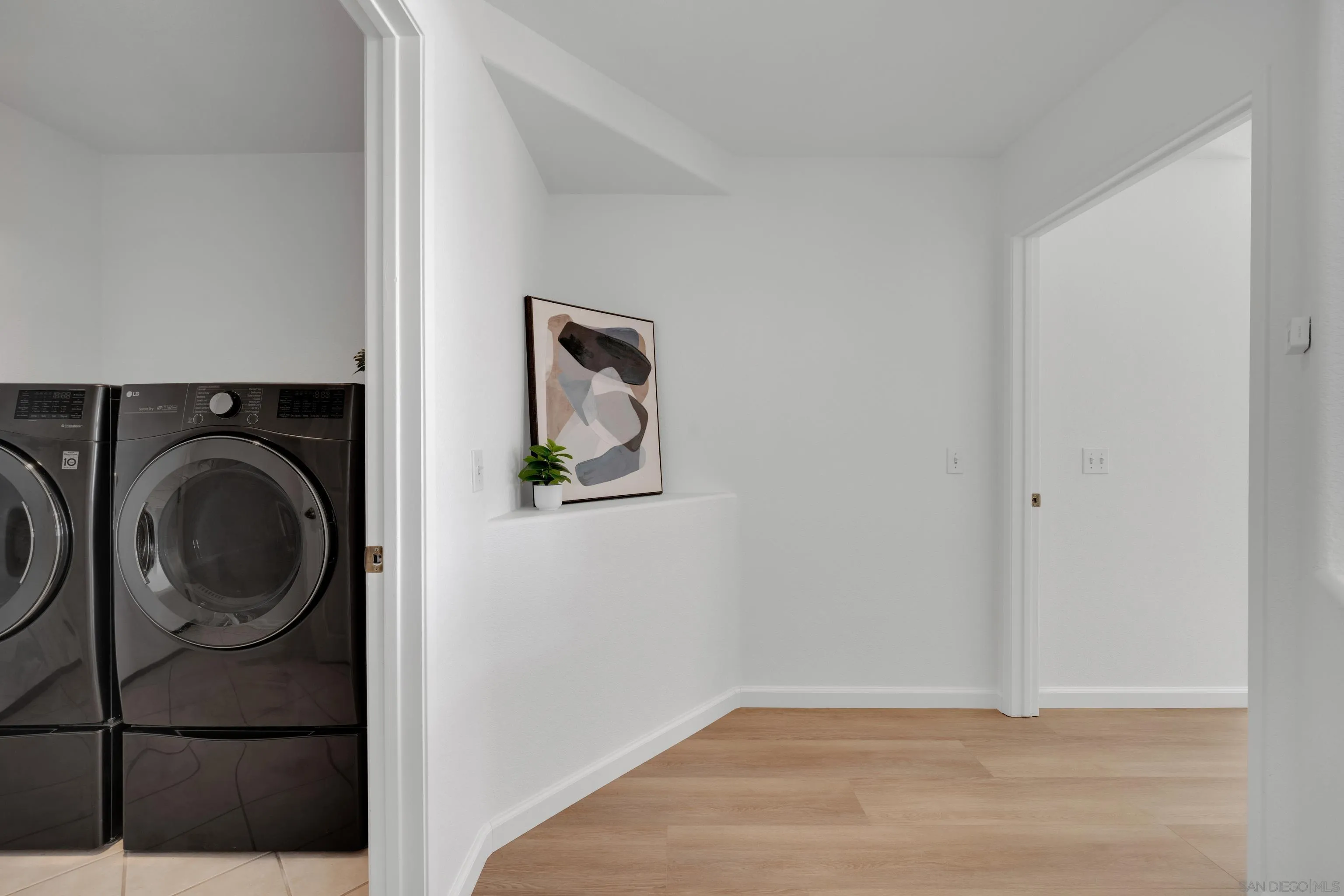 2334 Columbine Road Alpine, CA 91901 - Photo 30 of 42 a view of a hallway with washer and dryer