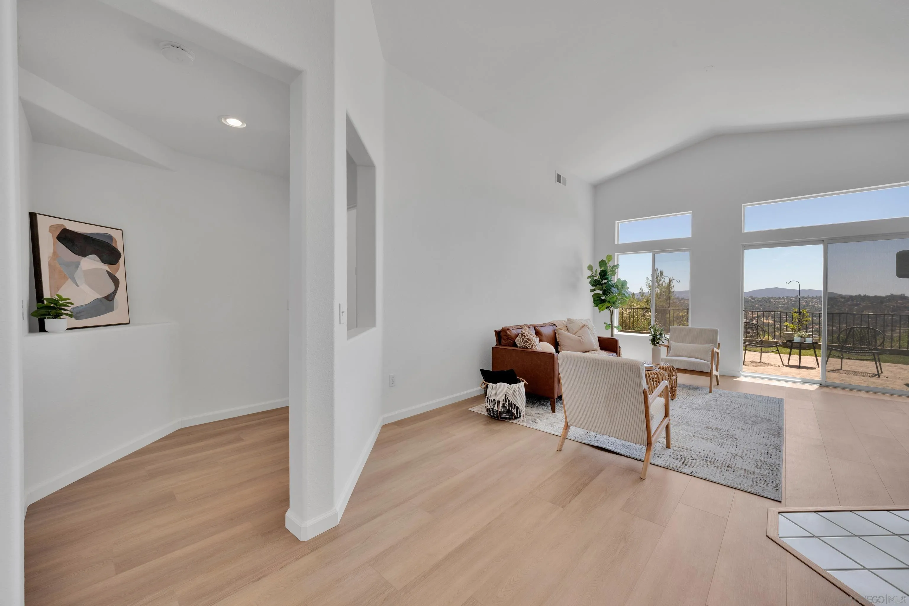 2334 Columbine Road Alpine, CA 91901 - Photo 31 of 42 a living room with furniture and a wooden floor