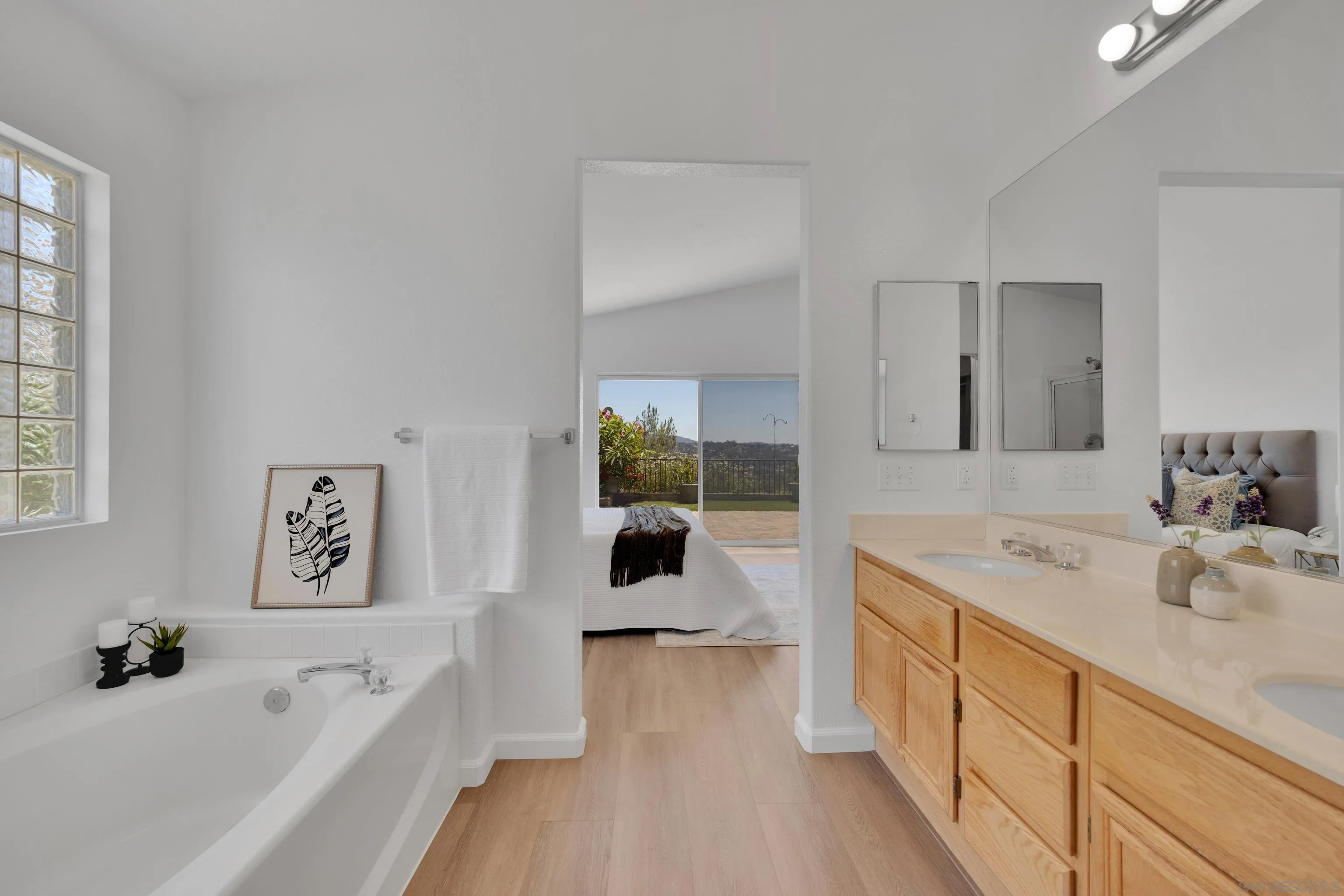 2334 Columbine Road Alpine, CA 91901 - Photo 35 of 42 a bathroom with a tub sink and mirror