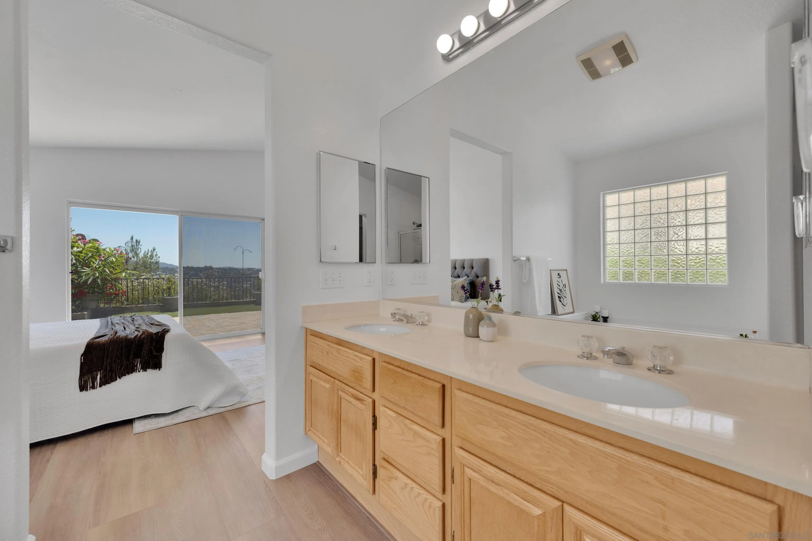 2334 Columbine Road Alpine, CA 91901 - Photo 37 of 42 a bathroom with a double vanity sink and a large mirror