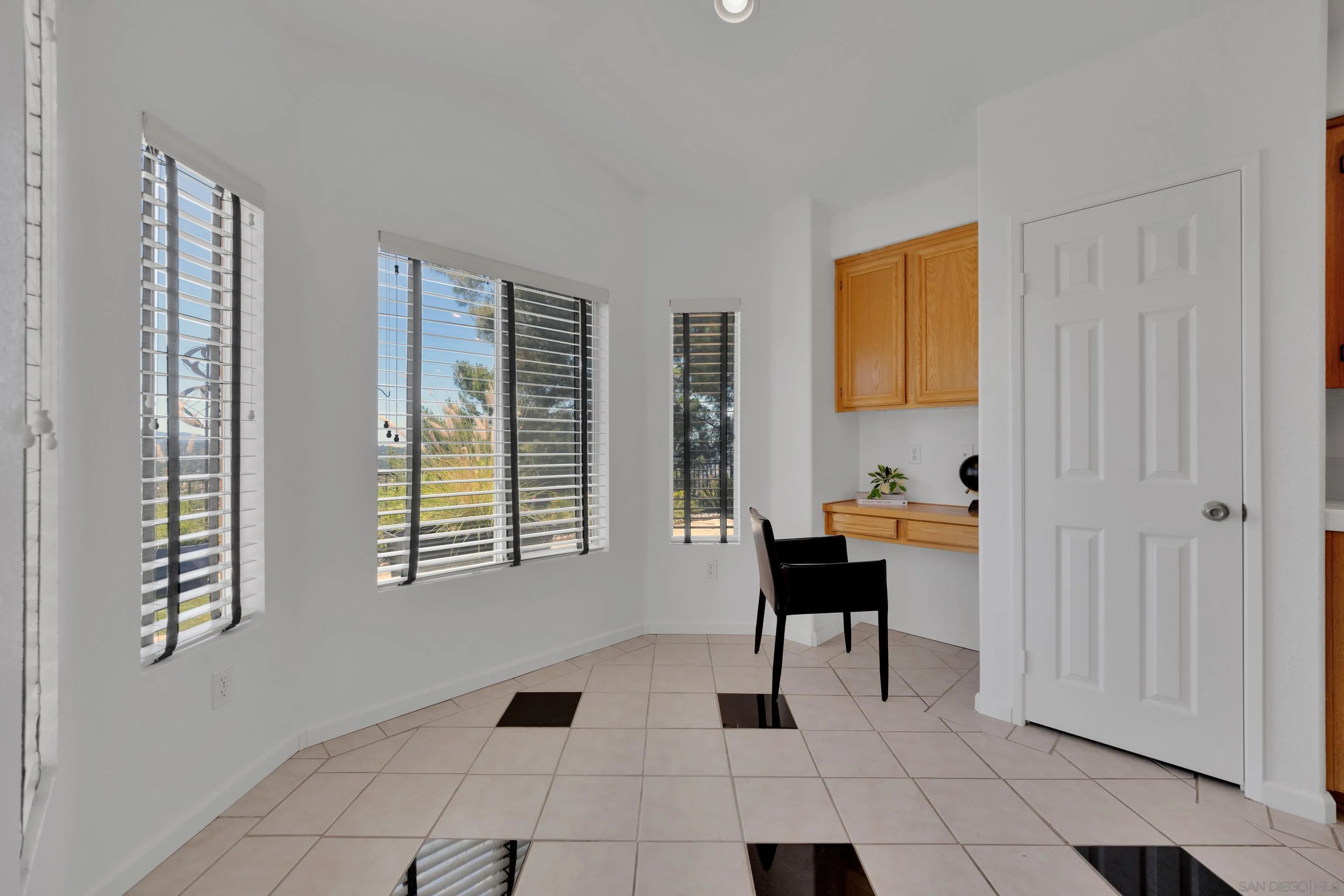 2334 Columbine Road Alpine, CA 91901 - Photo 8 of 42 a view of a workspace with furniture and a window
