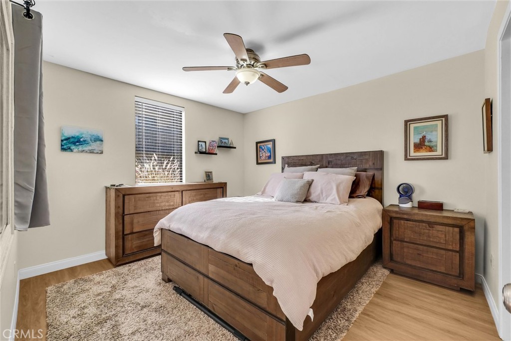 24351 Pasto Road Dana Point, CA 92629 - Photo 17 of 30 a bedroom with bed and window