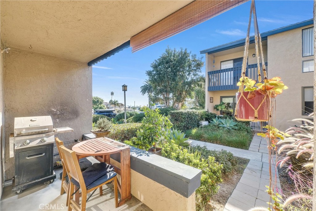 24351 Pasto Road Dana Point, CA 92629 - Photo 20 of 30 a view of a patio with table and chairs and potted plants