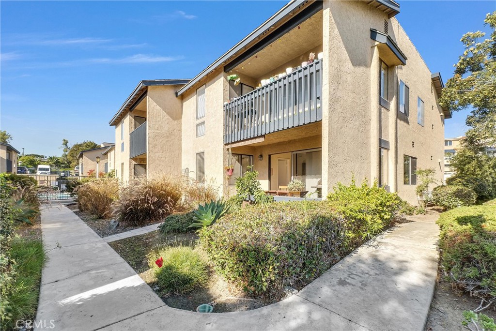 24351 Pasto Road Dana Point, CA 92629 - Photo 22 of 30 a front view of a house with garden