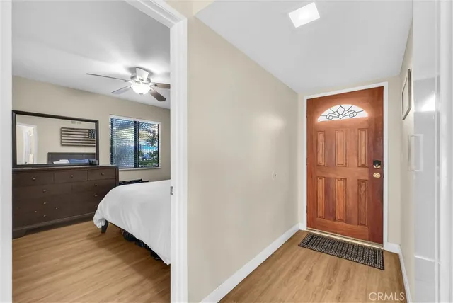 a view of a bedroom from a hallway