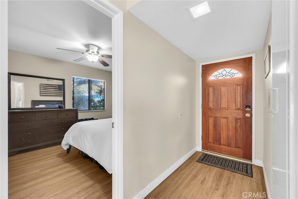 24351 Pasto Road Dana Point, CA 92629 - Photo 3 of 30 a view of a bedroom from a hallway