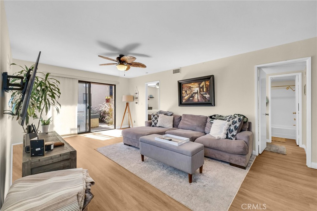 24351 Pasto Road Dana Point, CA 92629 - Photo 4 of 30 a living room with furniture and a large window