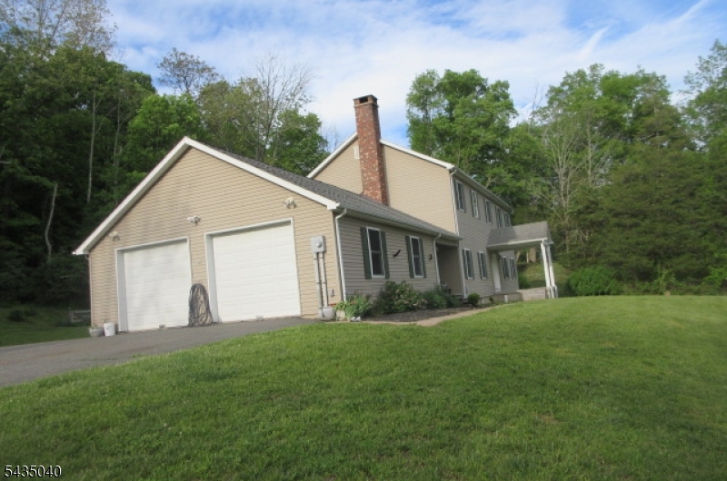 28 Beaver Run Road Lafayette, NJ 07848 - Photo 4 of 36 a front view of house with yard and green space