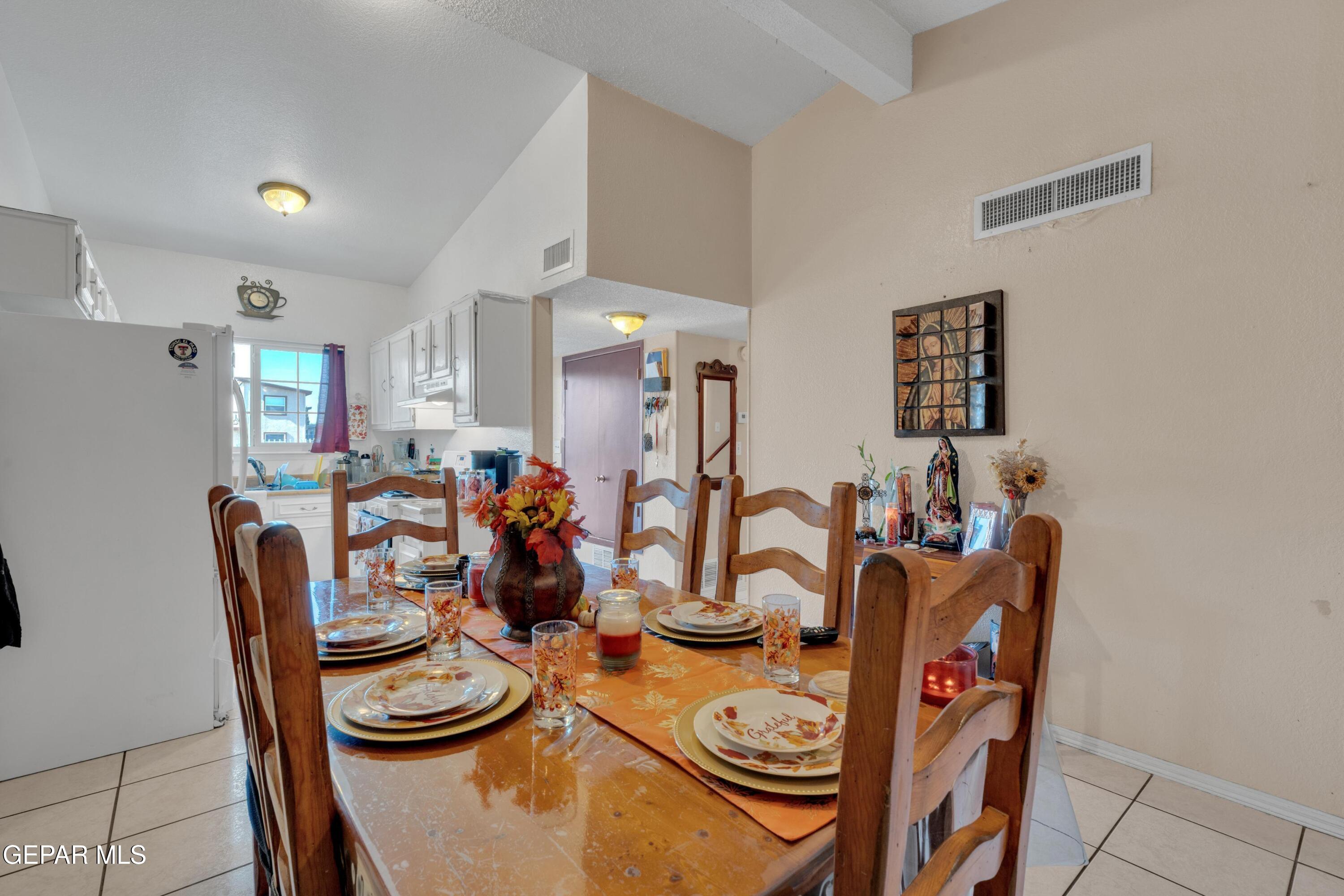 810 Silvestre Road El Paso, TX 79907 - Photo 11 of 33 a view of a dining room with furniture
