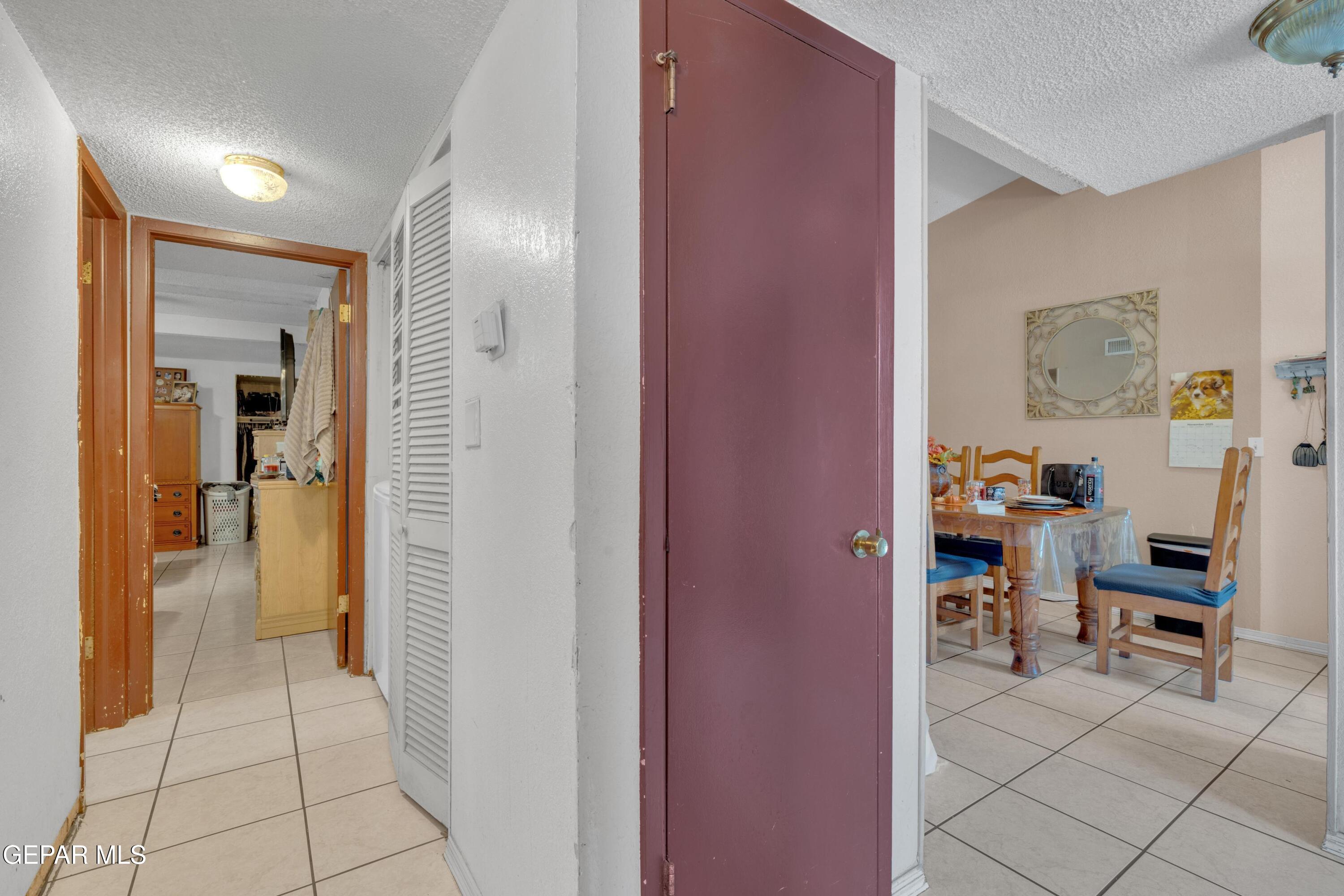 810 Silvestre Road El Paso, TX 79907 - Photo 18 of 33 a view of a hallway with bathroom and a bathroom