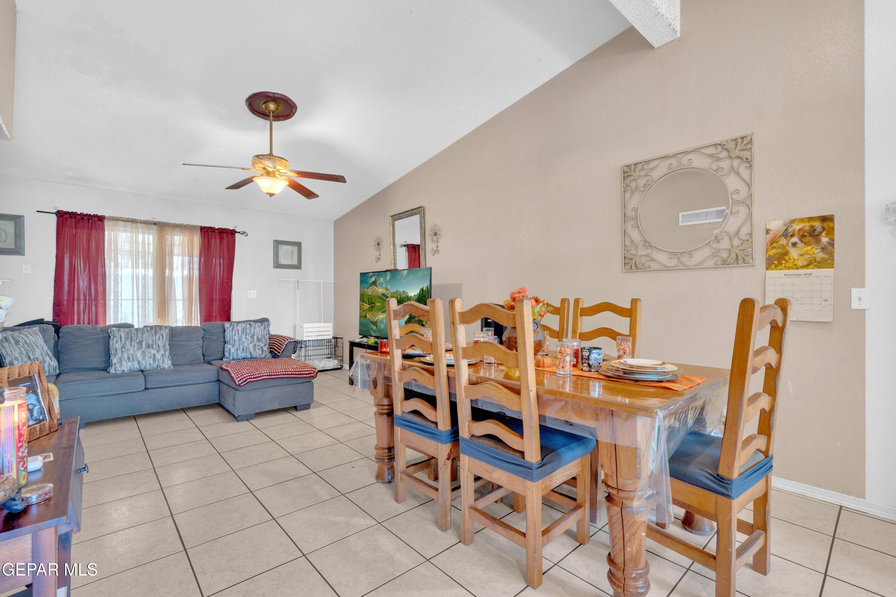 810 Silvestre Road El Paso, TX 79907 - Photo 8 of 33 a living room with furniture and painting on the wall