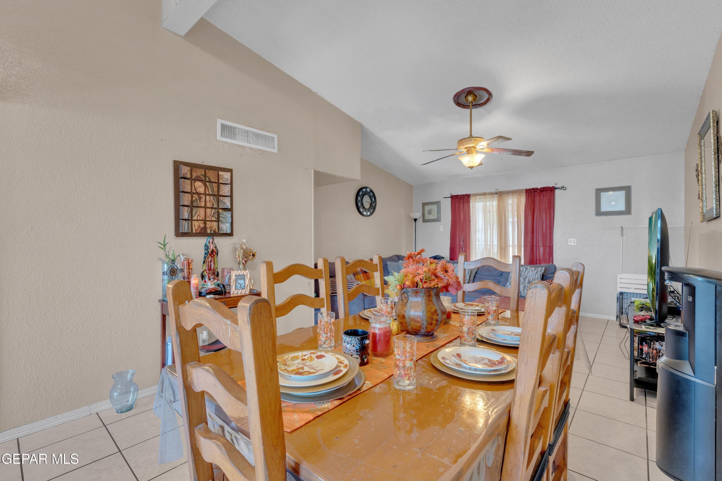 810 Silvestre Road El Paso, TX 79907 - Photo 9 of 33 a view of a dining room with furniture