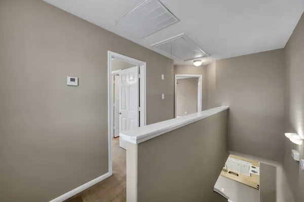 a view of a hallway with a small space