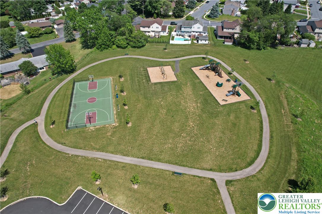 4502 Benjamin Court Emmaus, PA 18049 - Photo 51 of 53 An aerial perspective reveals a vibrant community park with recreational courts and play areas.