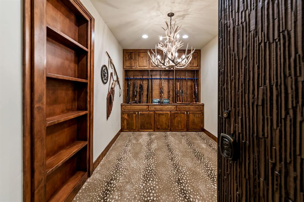 9930 Boat Club Road Fort Worth, TX 76179 - Photo 27 of 40 This versatile space in the main residence could be your gun room, whiskey lounge, office, and more!
