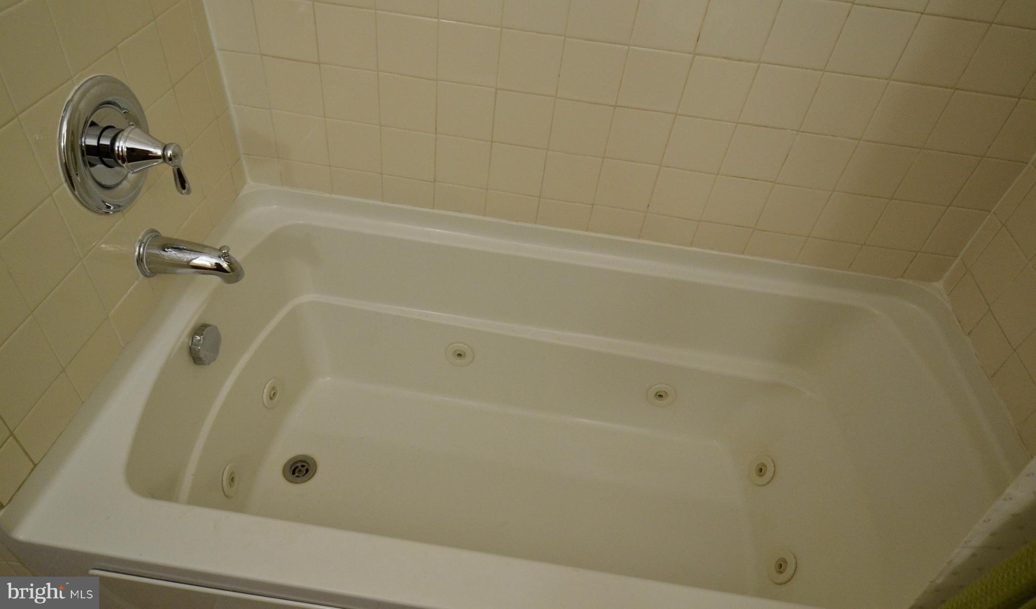 3709 Dennlyn Road Baltimore, MD 21215 - Photo 15 of 23 Jacuzzi tub in the second floor bathroom