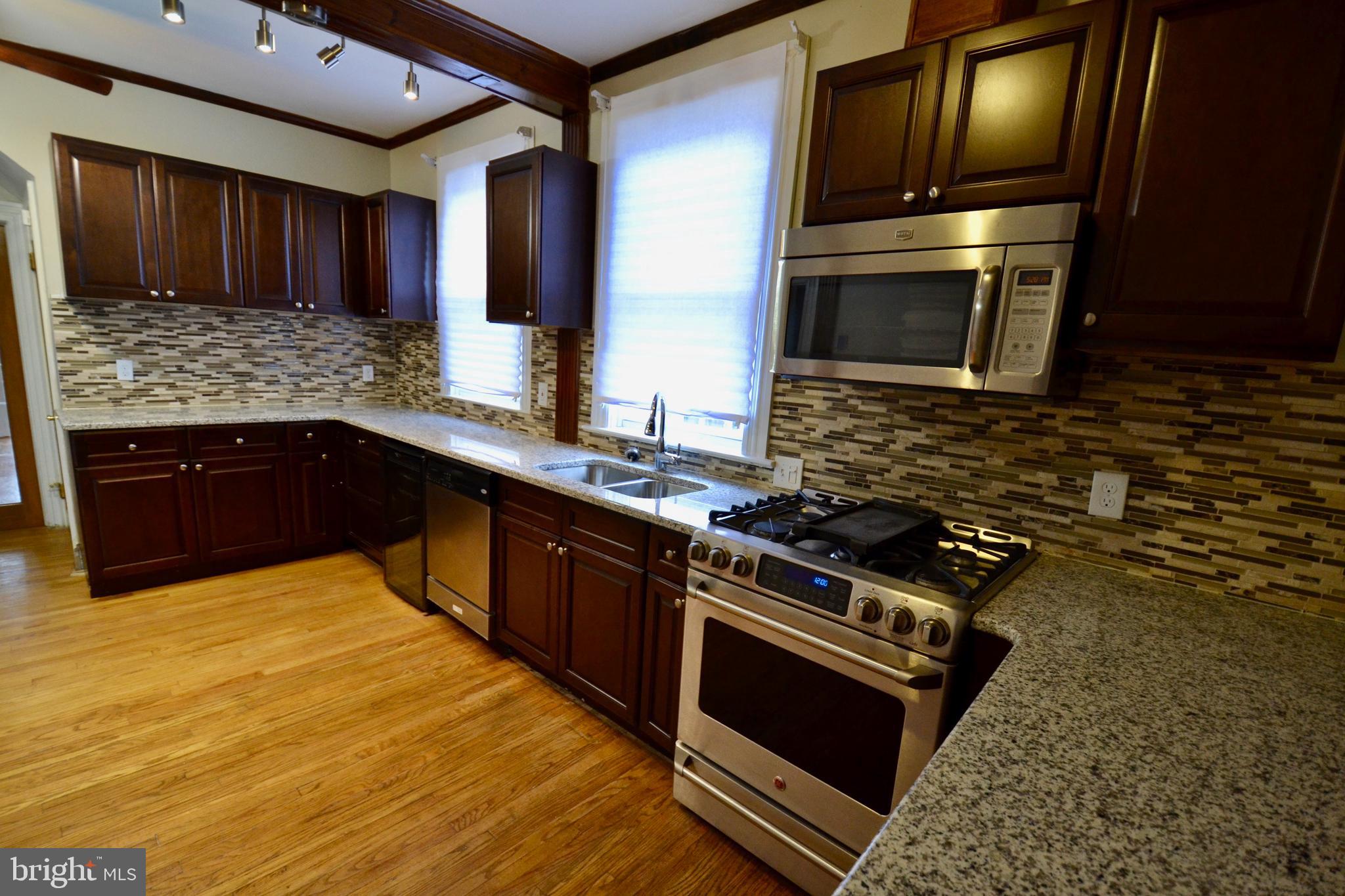3709 Dennlyn Road Baltimore, MD 21215 - Photo 8 of 23 Spacious, updated kitchen with wine fridge