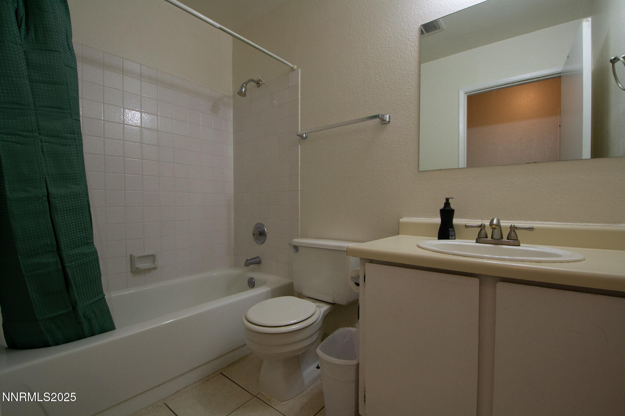 2080 Highview Court, Unit 2 Reno, NV 89512 - Photo 10 of 11 a bathroom with a sink a toilet and shower