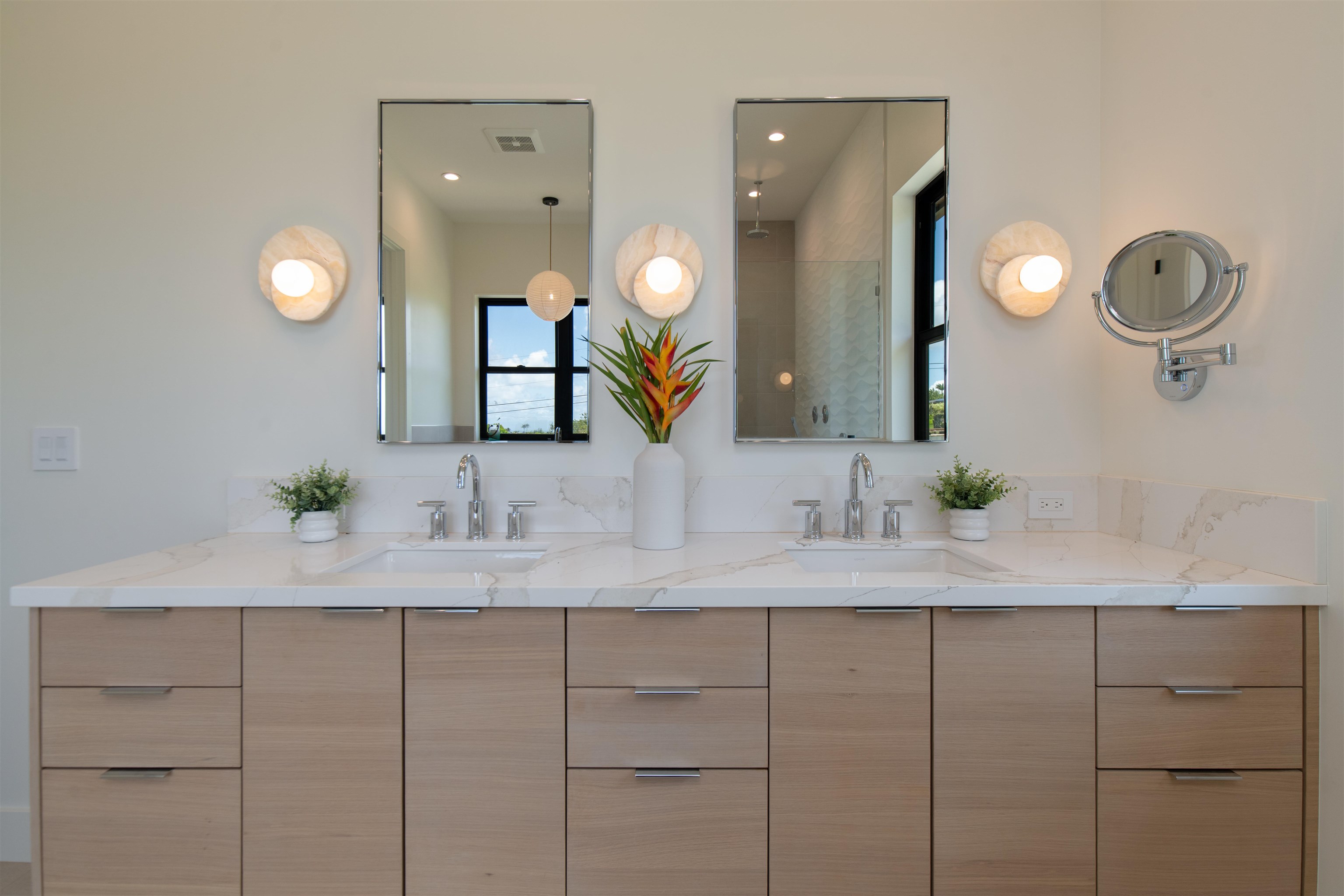 111 Mehana Road, Unit A Haiku, HI 96708 - Photo 46 of 50 a bathroom with a double vanity sink and a mirror