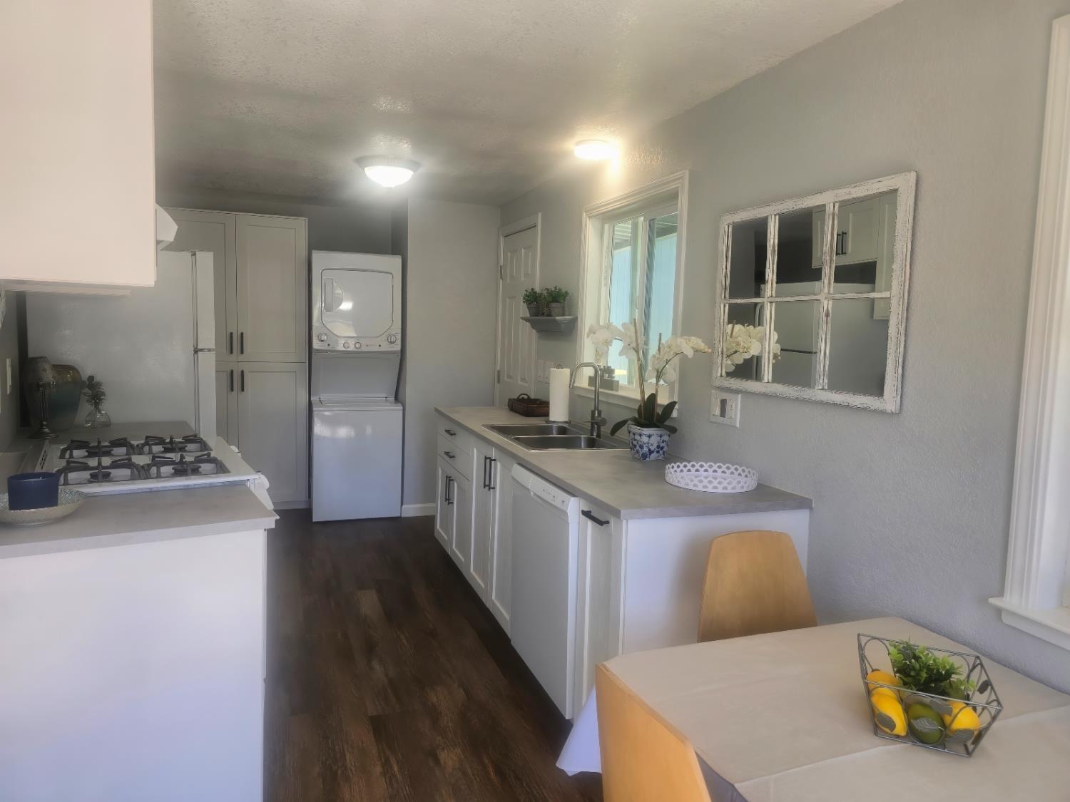 450 Gladycon Road, Unit 3 Colfax, CA 95713 - Photo 13 of 27 a kitchen with a sink stove and refrigerator