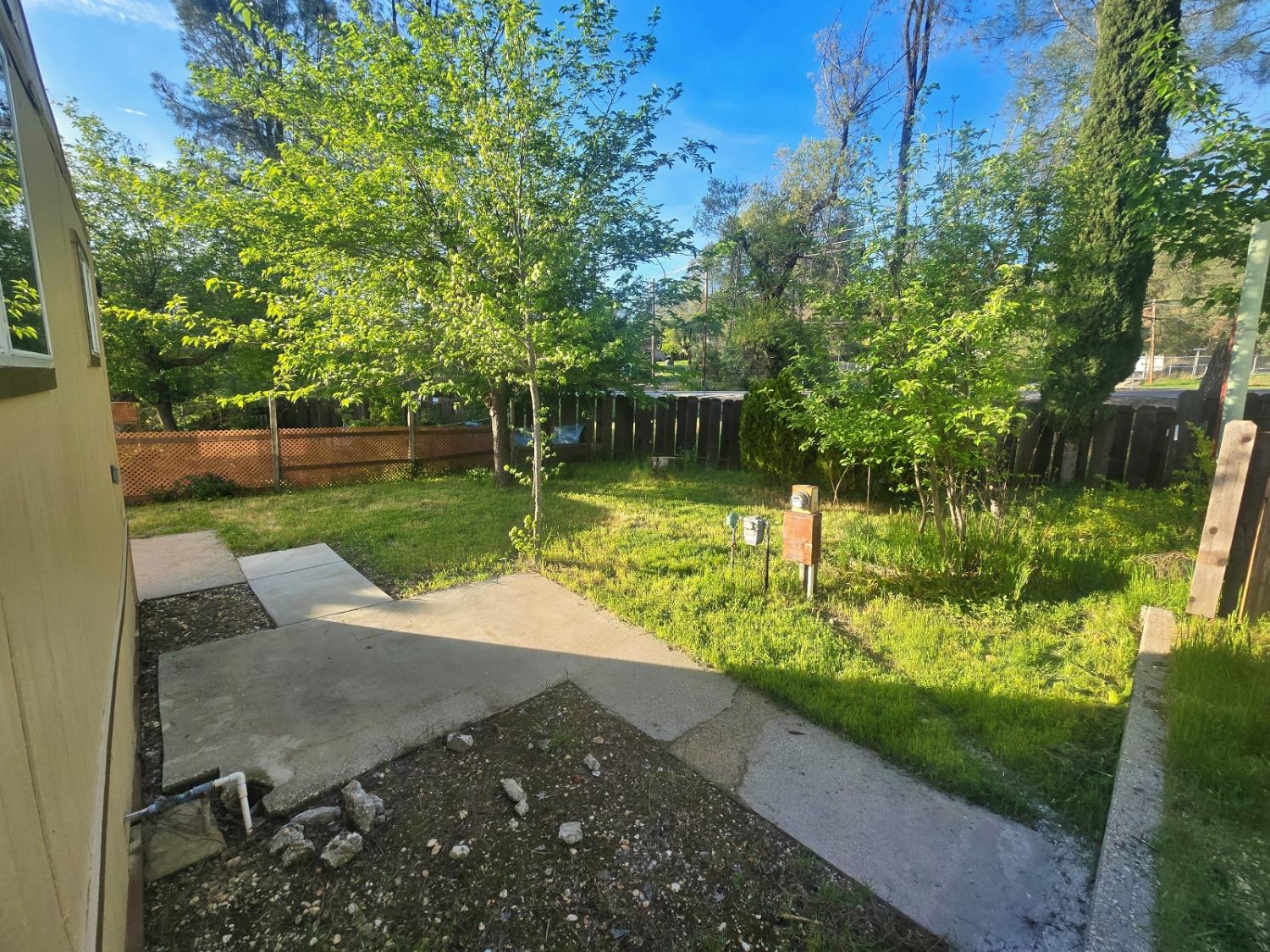 450 Gladycon Road, Unit 3 Colfax, CA 95713 - Photo 25 of 27 a view of a lake with a yard
