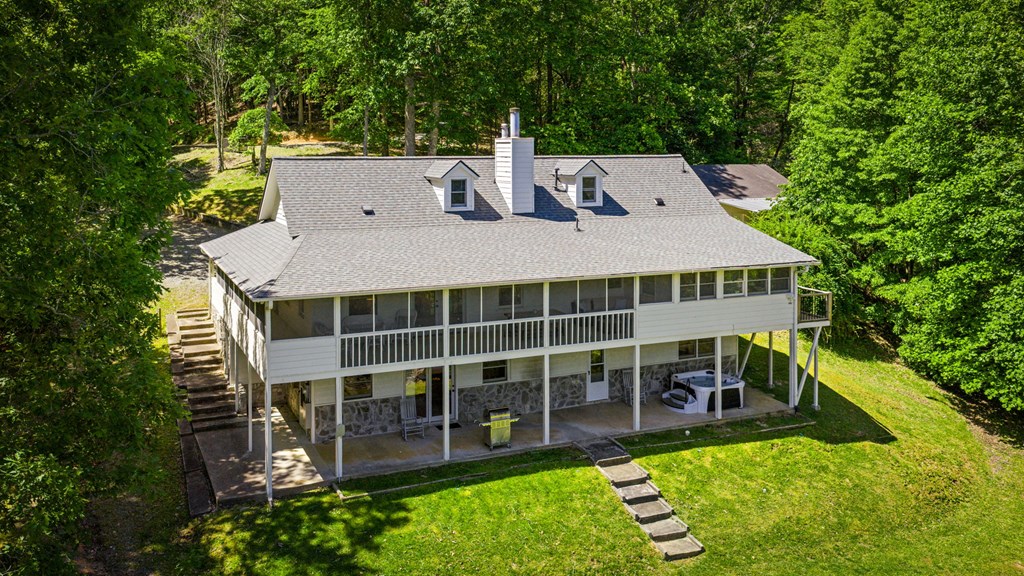 760 River Bend Lane Blue Ridge, GA 30513 - Photo 85 of 101 a view of a house with a backyard