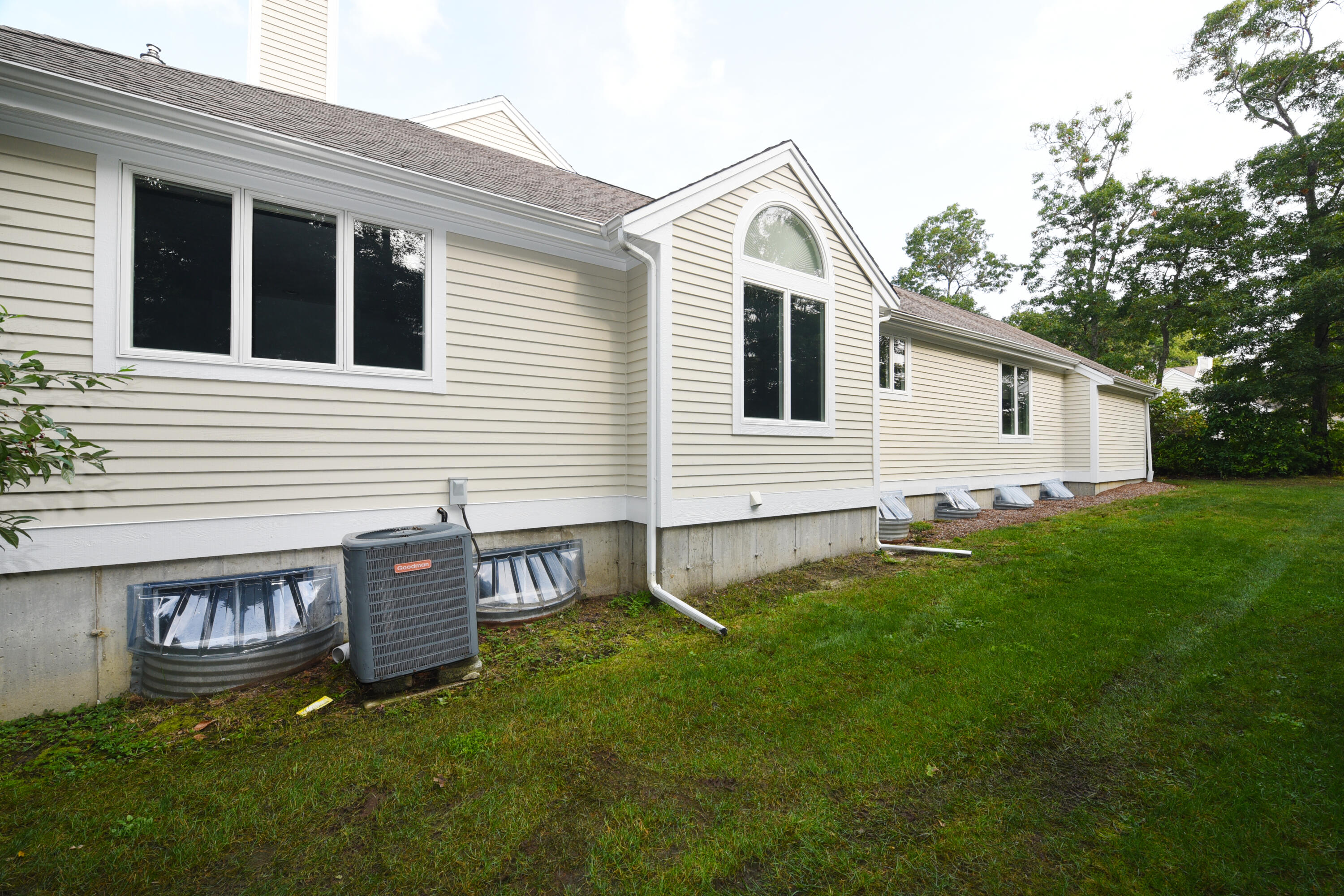 23 North Ridge Road Mashpee, MA 02649 - Photo 21 of 38 a view of house with backyard