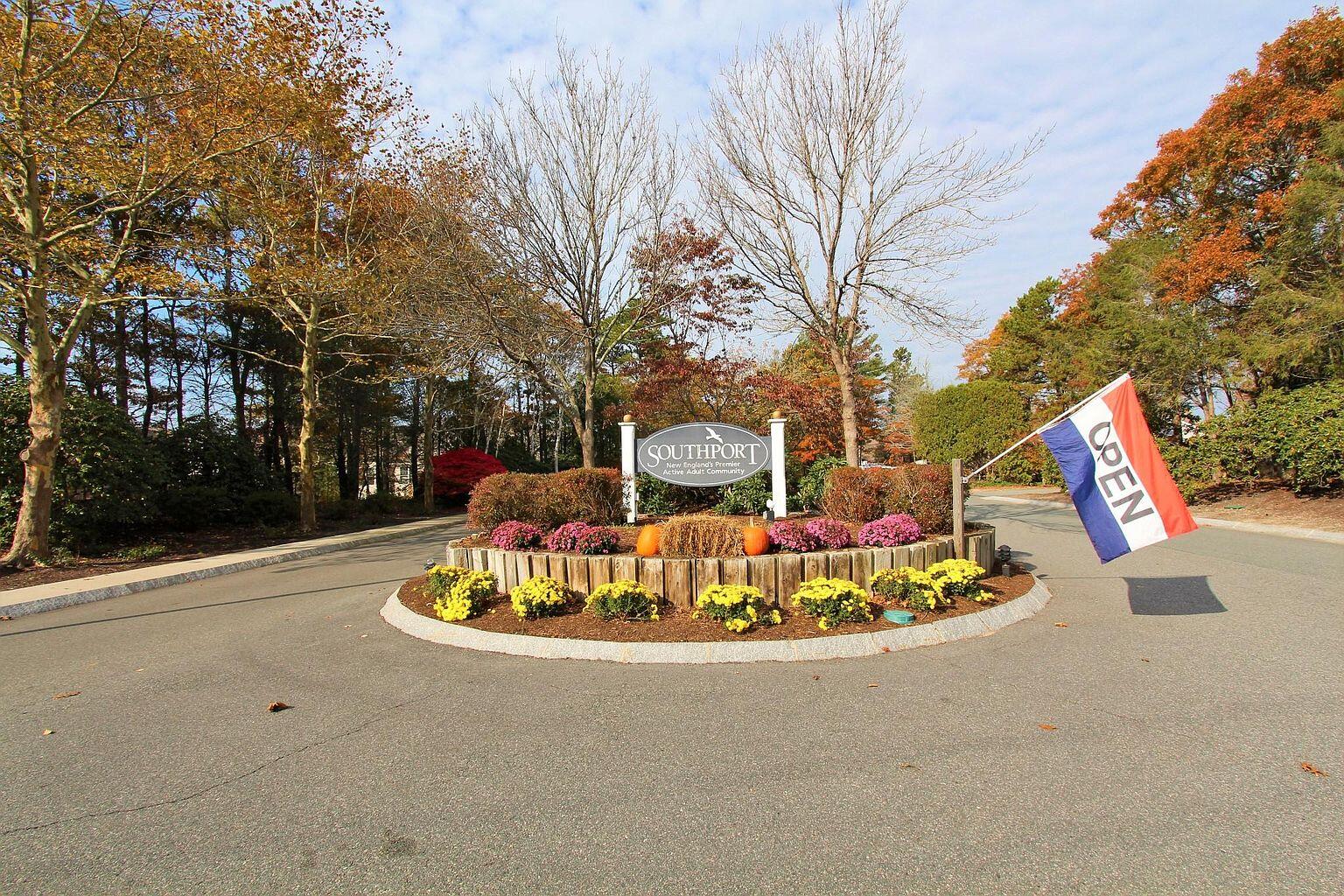 23 North Ridge Road Mashpee, MA 02649 - Photo 28 of 38 a park view with a fountain and large trees