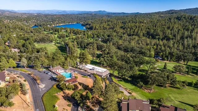 a view of a town with mountains in the background