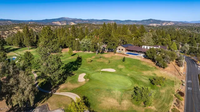 a view of a city with mountains in the background