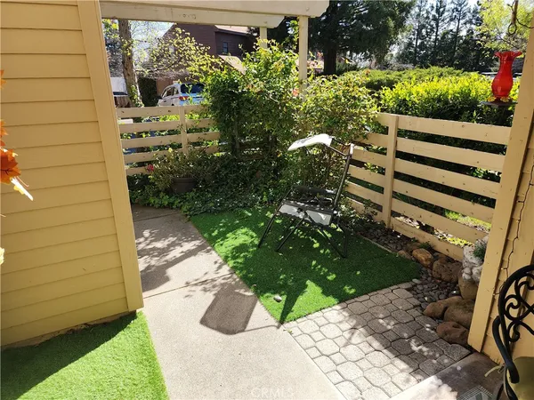 a view of yard with patio