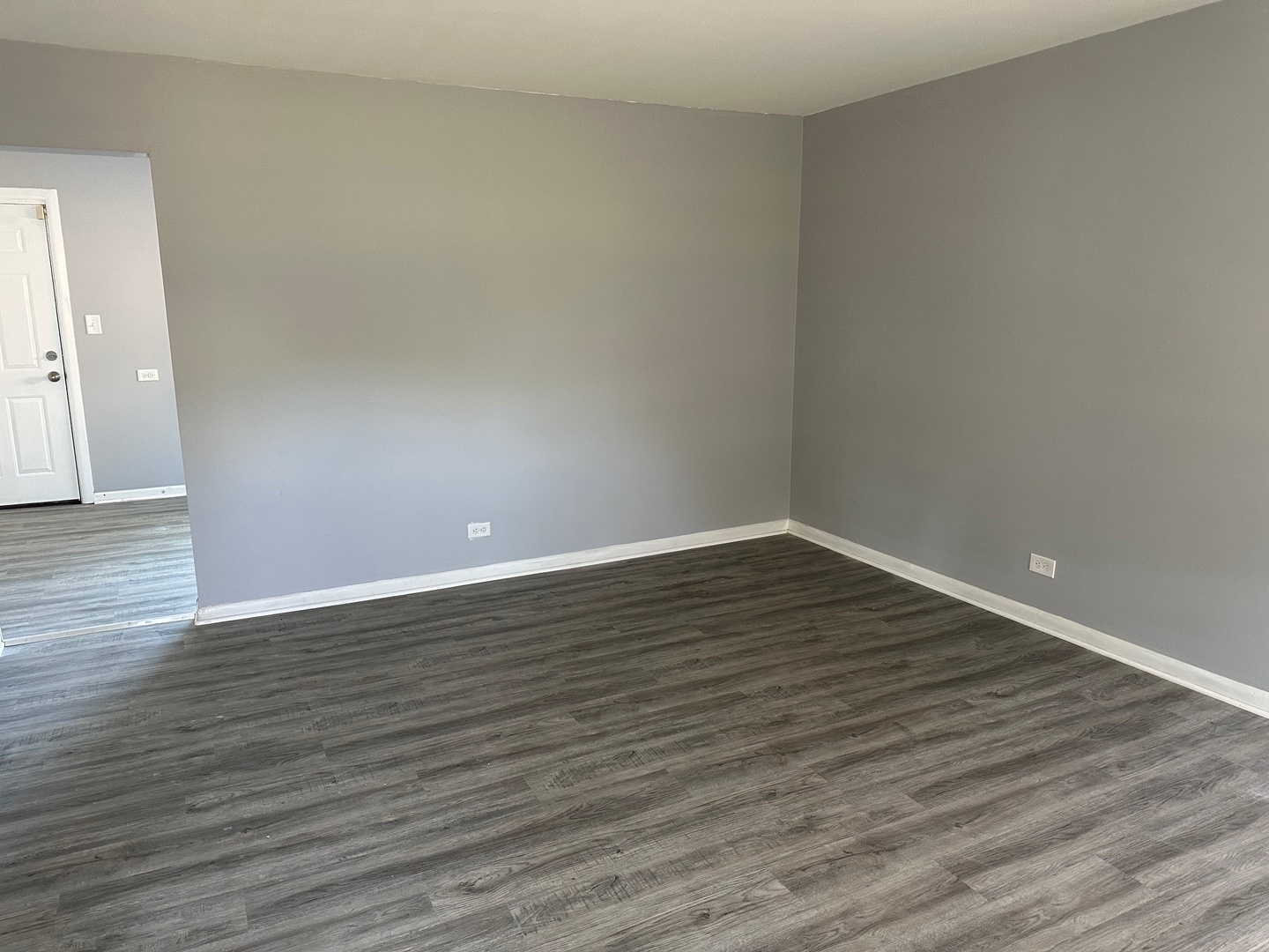 2956 Sherwood Avenue Markham, IL 60428 - Photo 2 of 13 a view of an empty room with wooden floor