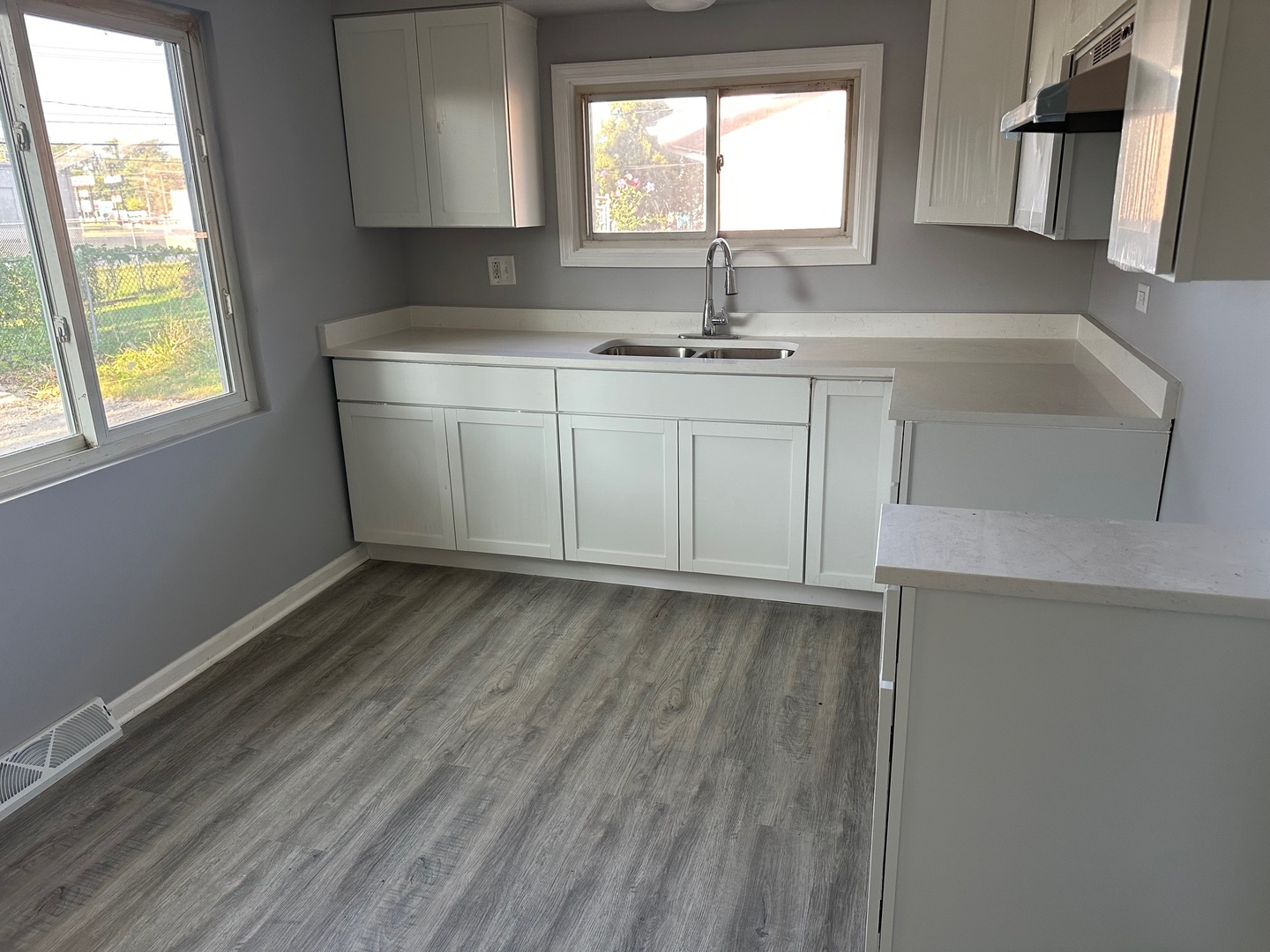 2956 Sherwood Avenue Markham, IL 60428 - Photo 6 of 13 a room with a sink cabinets and entryway