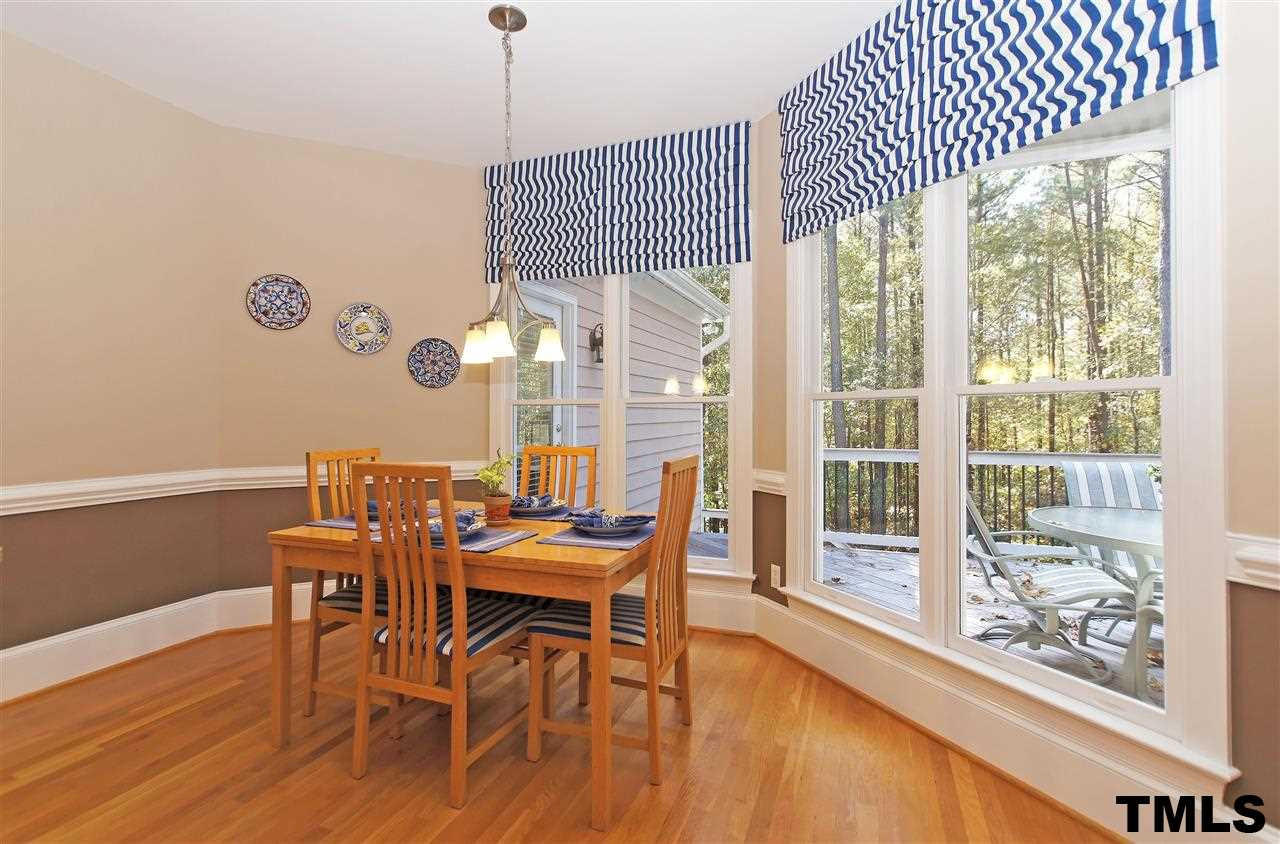 2321 Primrose Valley Court Raleigh, NC 27613 - Photo 10 of 24 BREAKFAST AREA WITH LARGE WINDOWS OVER LOOKS DECK AND WOODED LOT! Breakfast Area