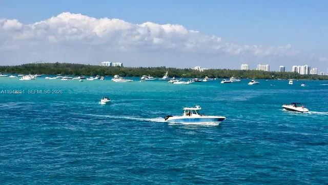 a view of a lake with a big yard