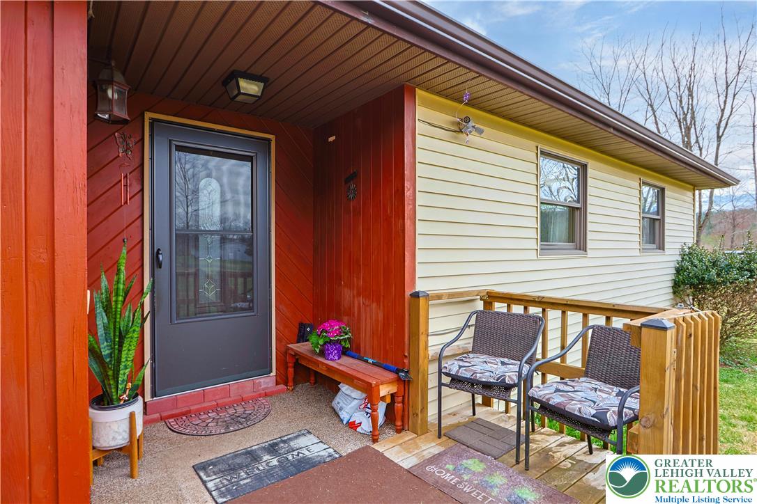 3134 Ross Road Saylorsburg, PA 18353 - Photo 2 of 47 a backyard of a house with outdoor seating