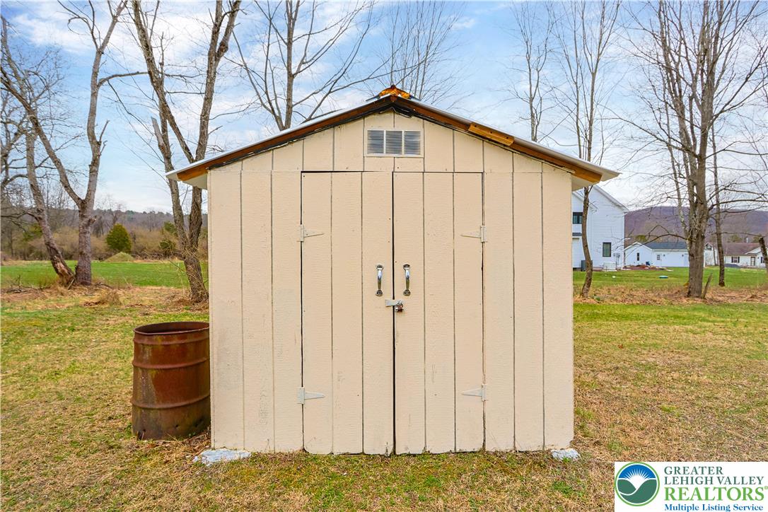 3134 Ross Road Saylorsburg, PA 18353 - Photo 29 of 47 a view of a backyard of the house