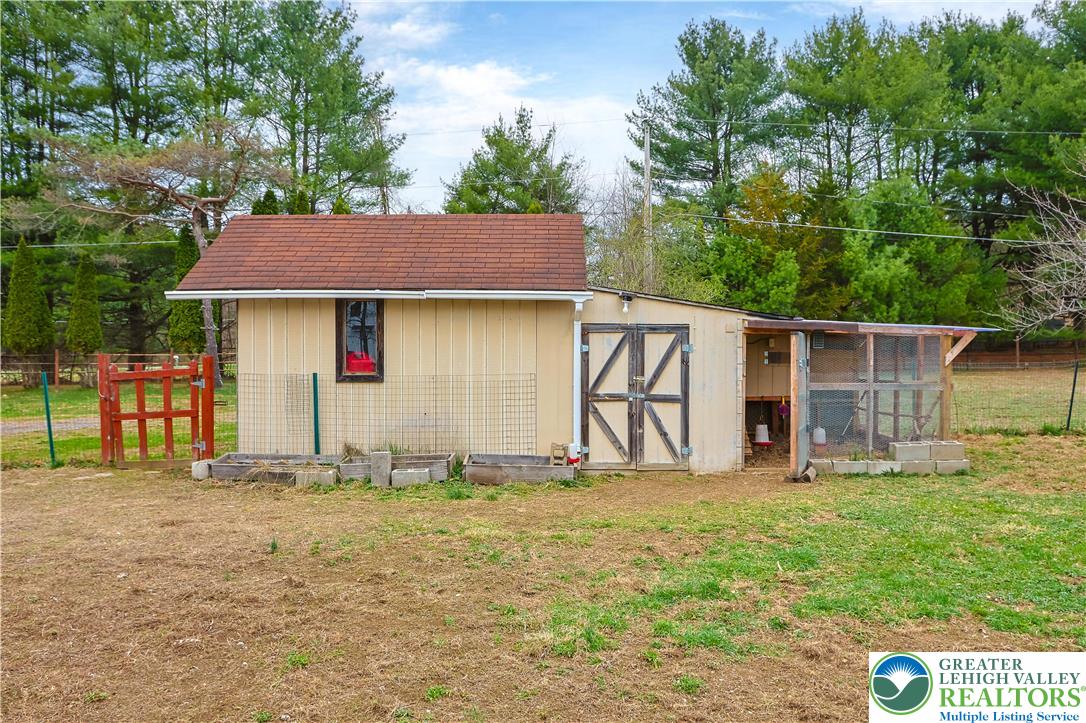 3134 Ross Road Saylorsburg, PA 18353 - Photo 30 of 47 a front view of a house with a yard