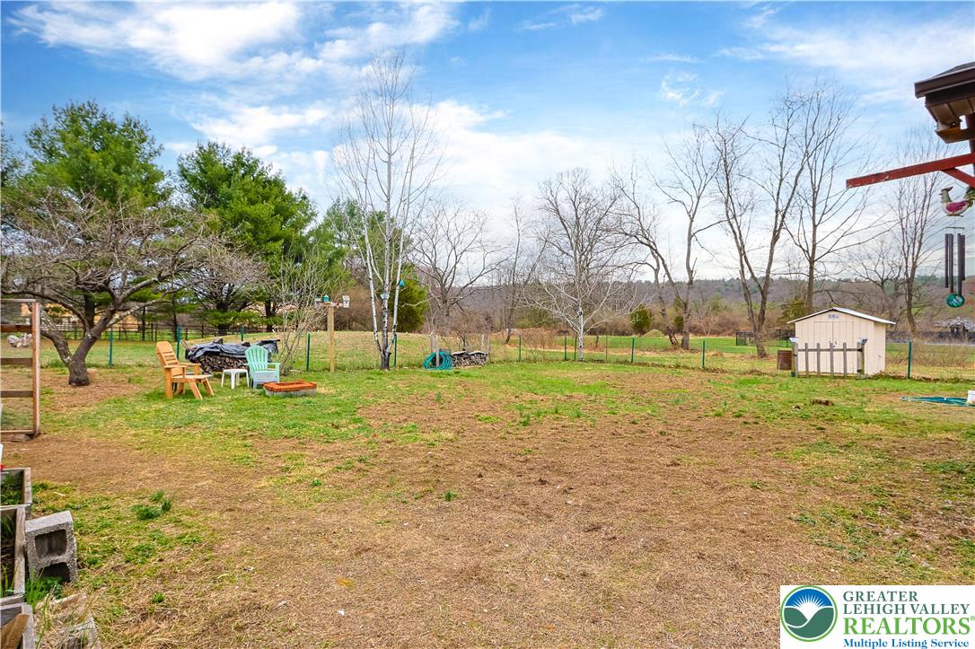3134 Ross Road Saylorsburg, PA 18353 - Photo 33 of 47 a backyard of apartments with large trees