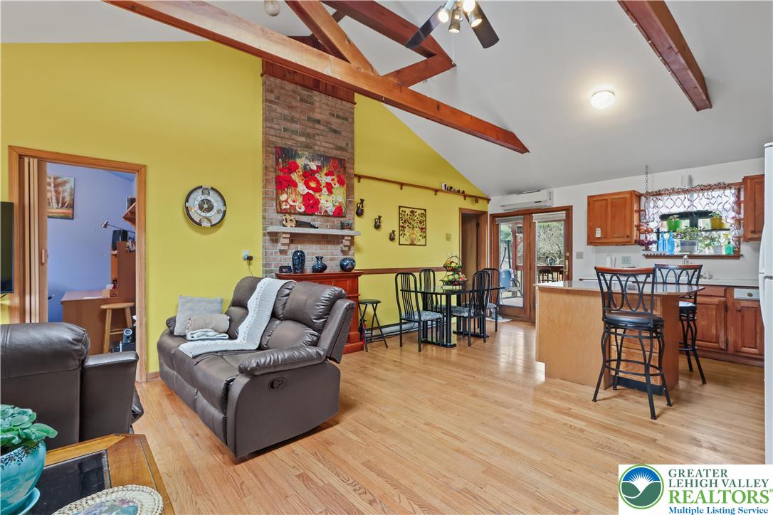 3134 Ross Road Saylorsburg, PA 18353 - Photo 7 of 47 a living room with furniture and wooden floor