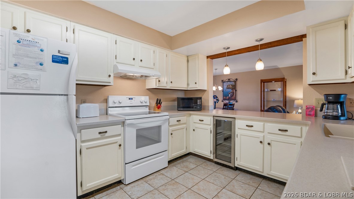5940 Baydy Peak Road, Unit 123 Osage Beach, MO 65065 - Photo 6 of 43 Lots of cabinets